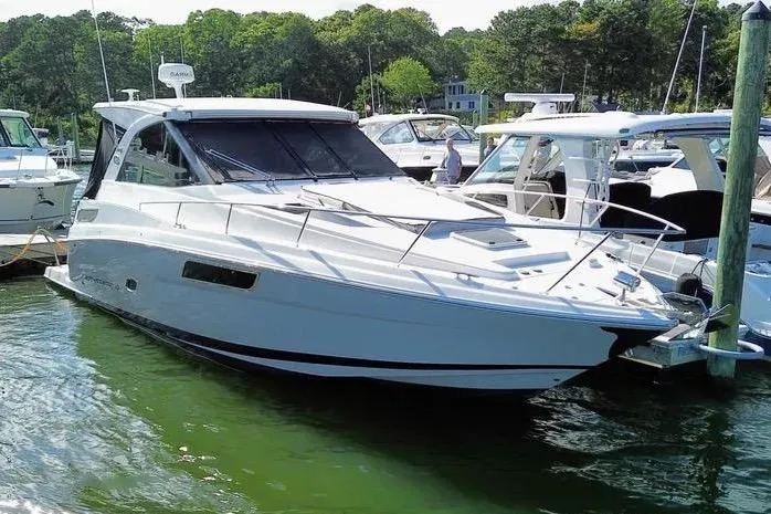 Willowbender Yacht Photos Pics 2019 Regal 35 Sport Coupe docked on a sunny day.