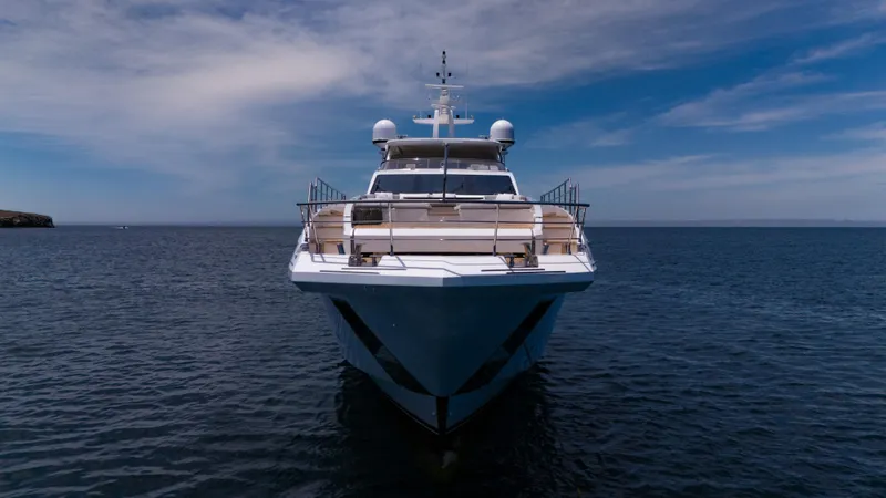  Yacht Photos Pics Front view of 2019 Azimut Grande 35 Metri yacht on calm sea under blue sky.