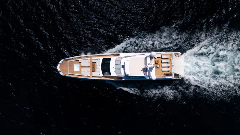  Yacht Photos Pics Aerial view of 2019 Azimut Grande 35 Metri yacht cruising on open water.