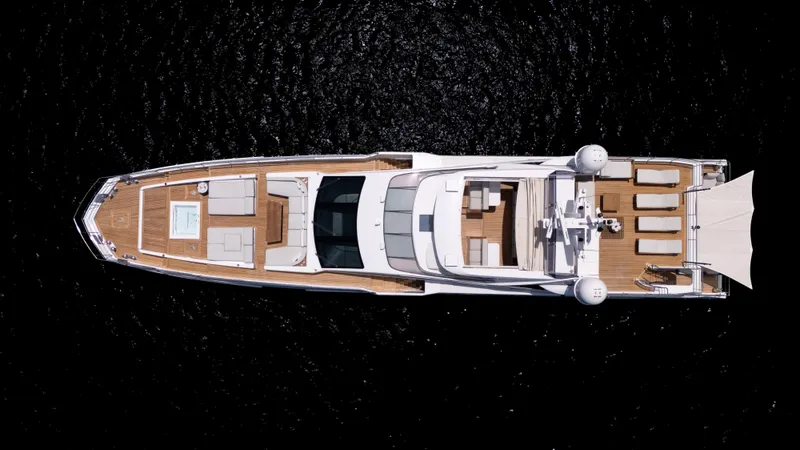 Yacht Photos Pics Overhead view of 2019 Azimut Grande 35 Metri luxury yacht on dark water.