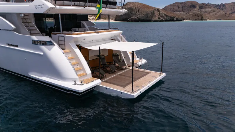  Yacht Photos Pics Luxury Azimut Grande 35 Metri yacht, 2019 model, with open deck and awning on calm water.