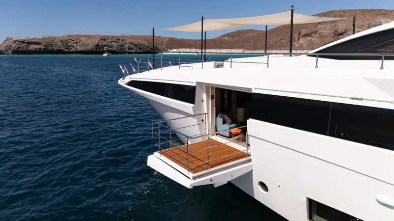  Yacht Photos Pics Luxury Azimut Grande 35 Metri yacht, 2019 model, anchored in serene coastal waters.