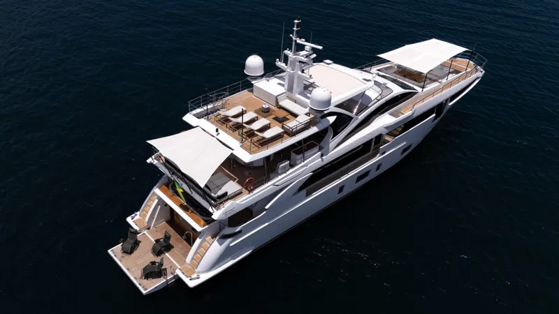  Yacht Photos Pics Luxurious 2019 Azimut Grande 35 Metri yacht on open water, aerial view.