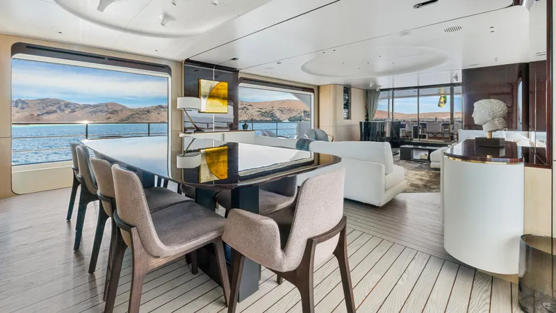  Yacht Photos Pics Luxurious interior of 2019 Azimut Grande 35 Metri yacht with elegant dining and seating areas.