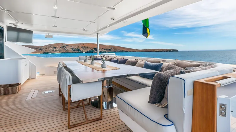  Yacht Photos Pics Luxurious 2019 Azimut Grande 35 Metri yacht deck with elegant seating and ocean view.