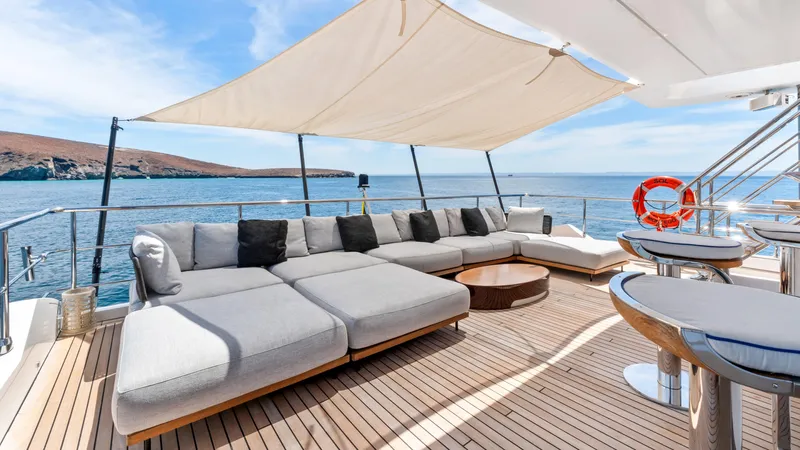  Yacht Photos Pics Luxurious deck of 2019 Azimut Grande 35 Metri yacht with seating and ocean view.