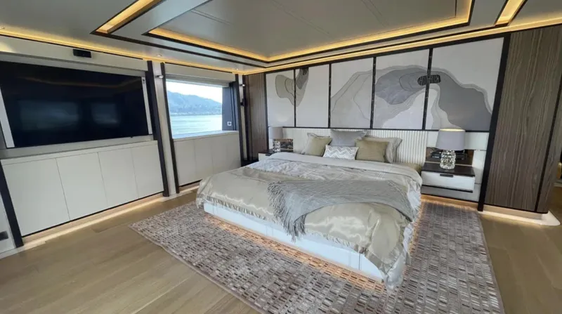  Yacht Photos Pics Luxurious bedroom interior of 2023 Heysea Asteria 142 yacht with modern decor and large bed.