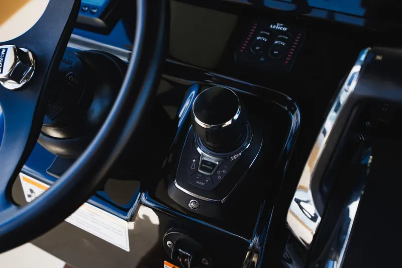  Yacht Photos Pics Close-up of 2022 Scout 305 LXF boat control panel and joystick.