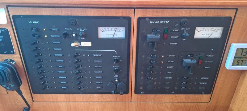 Bashful Yacht Photos Pics Electrical control panel of a 2006 Hunter 46 LE sailboat.