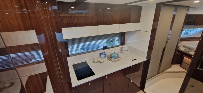 In Stock Yacht Photos Pics Luxurious kitchen interior of 2025 Fairline Targa 45 Open yacht.