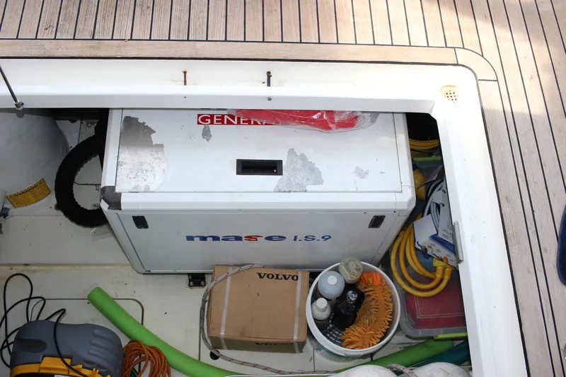  Yacht Photos Pics Fairline Phantom 2006 engine compartment with Mase IS.9 generator and various equipment.