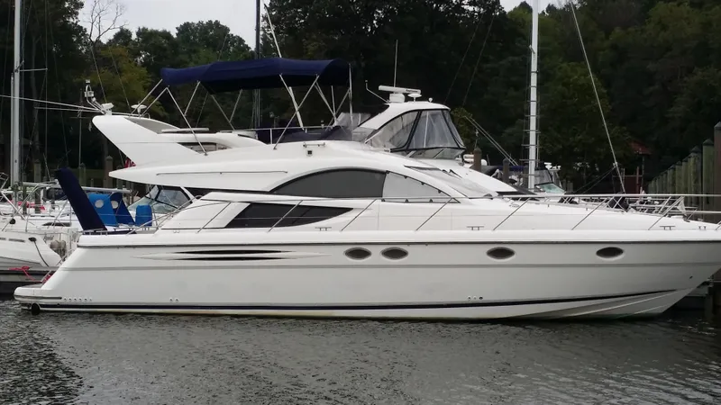  Yacht Photos Pics 2006 Fairline Phantom yacht docked at marina.