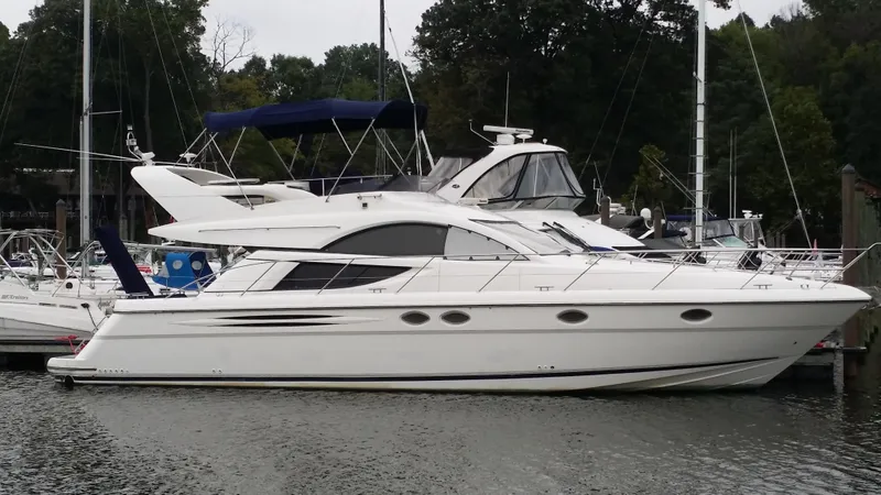  Yacht Photos Pics 2006 Fairline Phantom yacht docked in a marina.