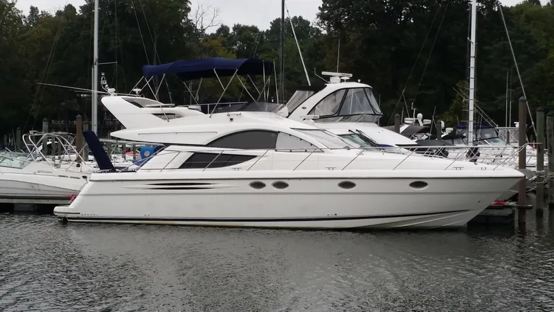  Yacht Photos Pics 2006 Fairline Phantom yacht docked at a marina.