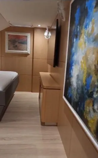 Feel So Good Yacht Photos Pics Luxurious interior of 2021 Privilege 640 yacht with modern art and elegant furnishings.