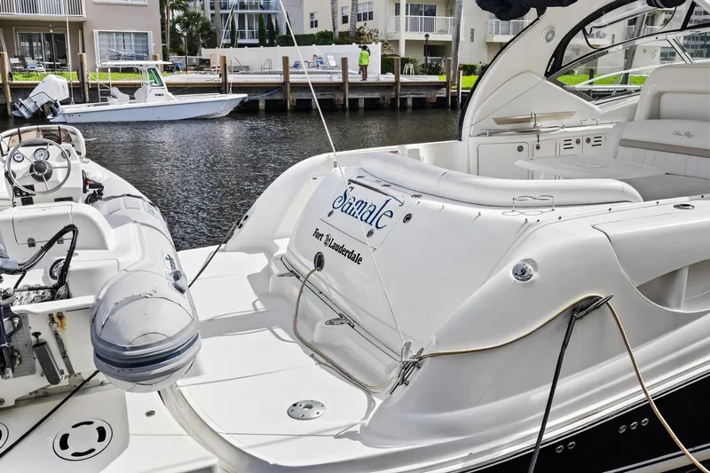  Yacht Photos Pics 2008 Sea Ray 44 Sundancer yacht docked at marina, featuring spacious deck and elegant design.