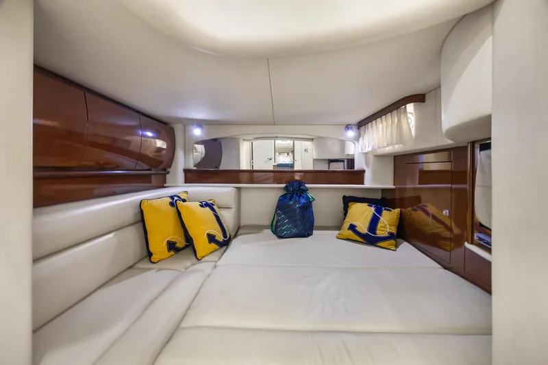  Yacht Photos Pics Luxurious interior cabin of 2008 Sea Ray 44 Sundancer yacht with plush seating and cushions.