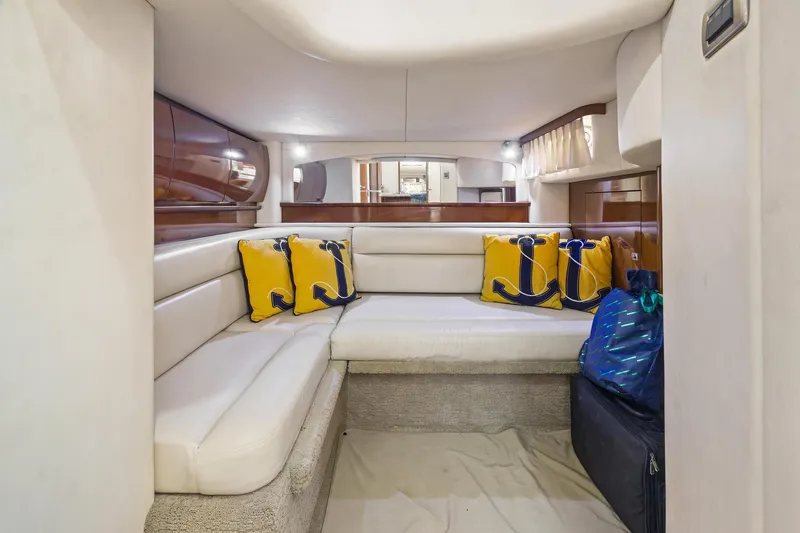  Yacht Photos Pics Interior of 2008 Sea Ray 44 Sundancer with cozy seating and nautical-themed cushions.