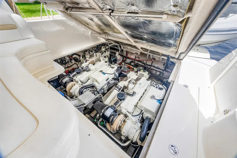  Yacht Photos Pics Engine compartment of 2008 Sea Ray 44 Sundancer yacht, showcasing dual engines and clean interior.