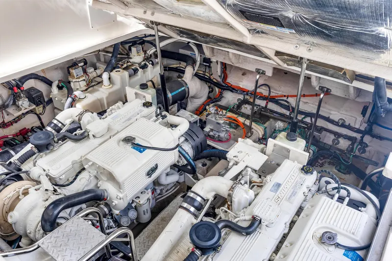  Yacht Photos Pics Engine room of 2008 Sea Ray 44 Sundancer yacht, showcasing dual engines and mechanical components.