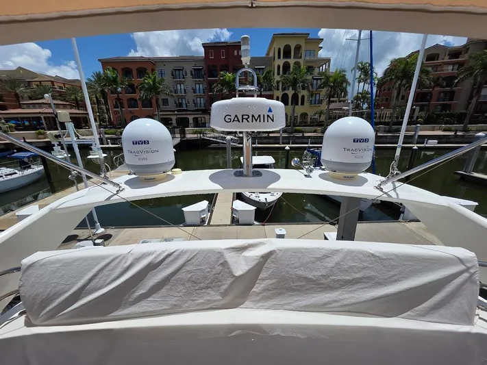 Just Peachy Yacht Photos Pics 2015 Prestige 550 Fly yacht with Garmin and TracVision equipment docked at marina.