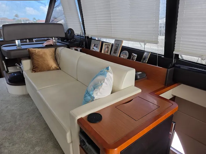 Just Peachy Yacht Photos Pics Luxurious interior of a 2015 Prestige 550 Fly yacht with elegant seating and decor.