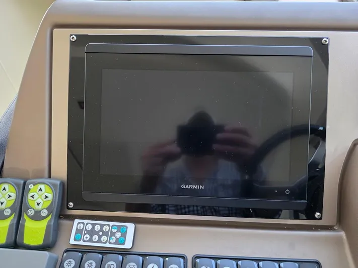 Just Peachy Yacht Photos Pics Garmin display and controls on 2015 Prestige 550 Fly yacht dashboard.