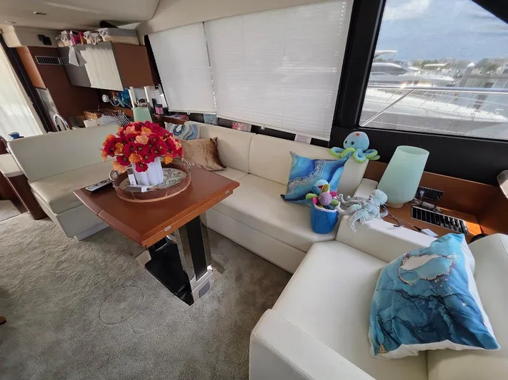 Just Peachy Yacht Photos Pics Luxurious interior of 2015 Prestige 550 Fly yacht with elegant seating and decor.