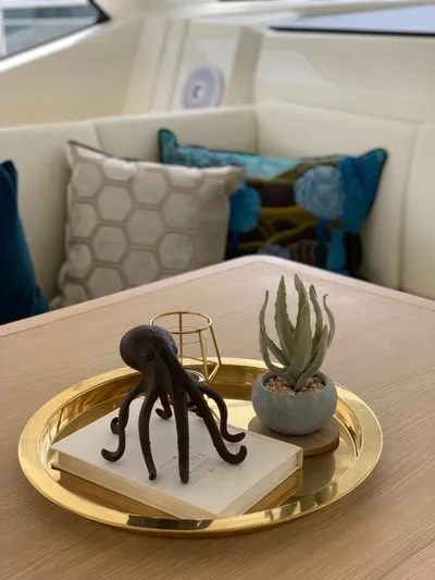 Charis Yacht Photos Pics Decorative tray with octopus sculpture and plant on Aquila 44 Yacht, 2020 model.