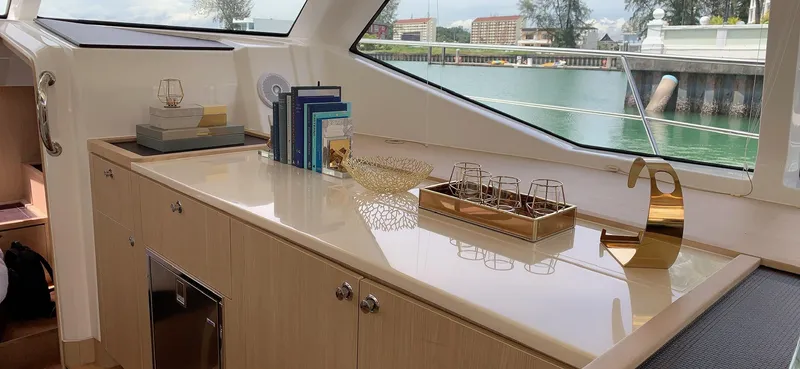 Charis Yacht Photos Pics Luxurious interior of 2020 Aquila 44 Yacht with elegant decor and waterfront view.