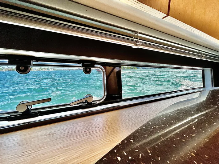 Naomi Yacht Photos Pics 2014 Fairline Targa 38 Open yacht window view of blue ocean water.