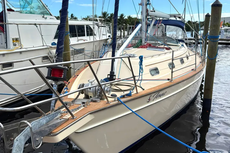 Texas Yacht Photos Pics Island Packet 420 sailboat, 2001 model, docked at marina with clear skies.