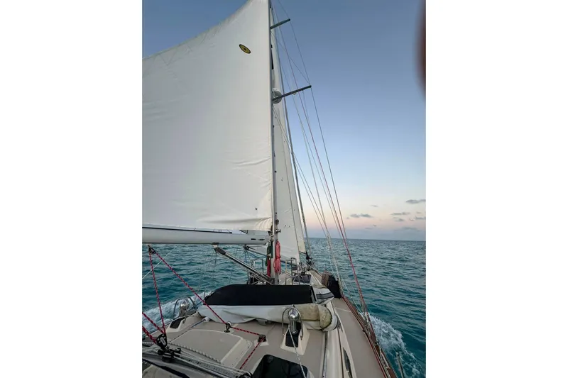 Texas Yacht Photos Pics Sailing on a 2001 Island Packet 420 yacht at sea during sunset.