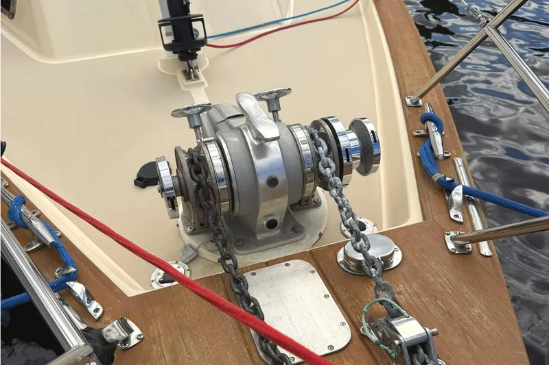 Texas Yacht Photos Pics Anchor windlass on 2001 Island Packet 420 sailboat deck, with chains and ropes.