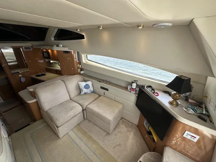  Yacht Photos Pics Luxurious interior of a 2002 Regal 3880 yacht with comfortable seating and modern amenities.