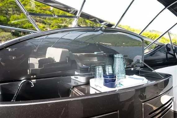 Voltor Yacht Photos Pics Luxurious bar on the 2016 Riva 63 Virtus yacht.