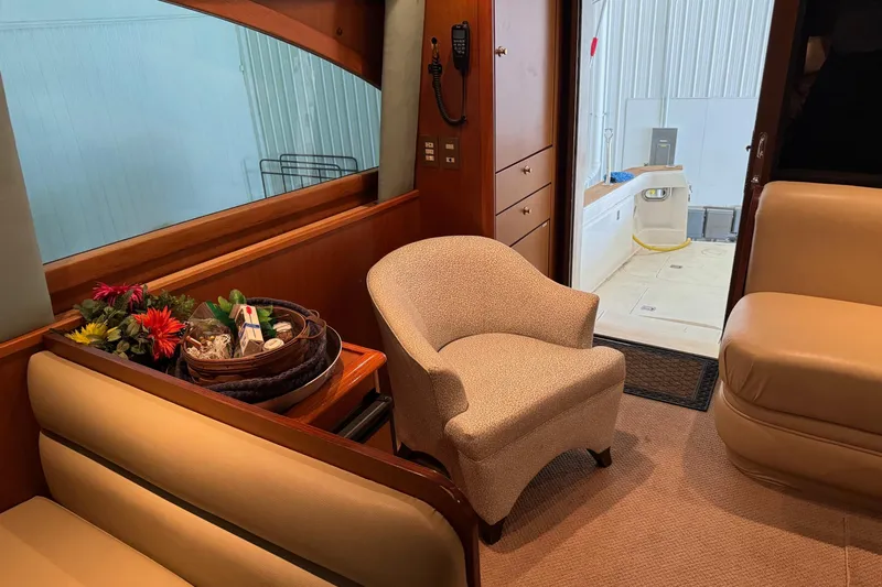 City Island Yacht Photos Pics Luxurious interior of 2005 Fifth Ocean Yachts 46 SS with elegant seating and decor.