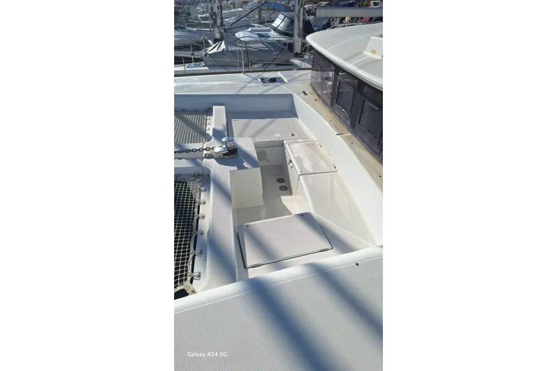  Yacht Photos Pics 2018 Lagoon 450 F catamaran deck with seating and netting.