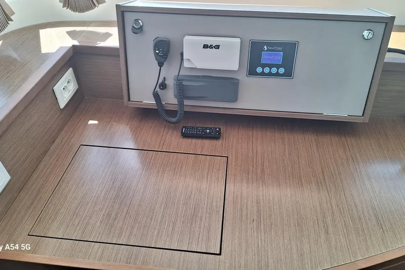  Yacht Photos Pics Control panel on 2018 Lagoon 450 F yacht with communication equipment and remote.