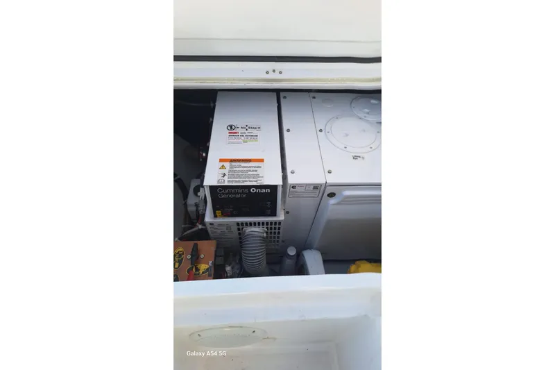  Yacht Photos Pics Cummins Onan generator in 2018 Lagoon 450 F yacht engine compartment.