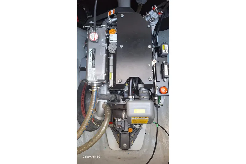  Yacht Photos Pics Engine compartment of a 2018 Lagoon 450 F catamaran, showcasing mechanical components.