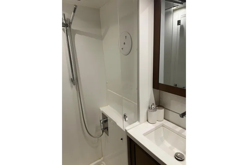  Yacht Photos Pics Bathroom interior of 2018 Lagoon 450 F yacht with modern shower and sink.