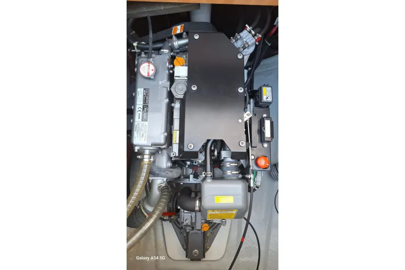  Yacht Photos Pics Engine compartment of a 2018 Lagoon 450 F catamaran, showcasing mechanical components.