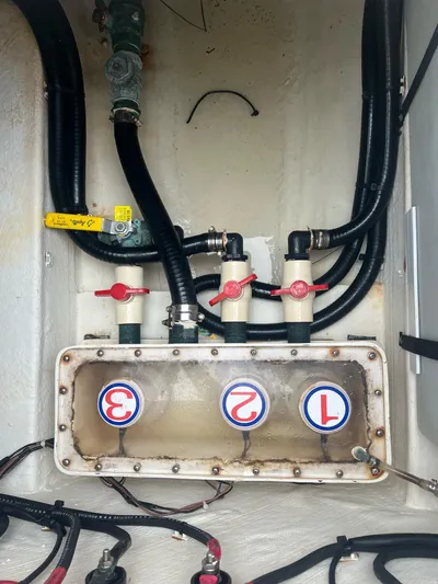 No Name Yacht Photos Pics 2015 Cobia 344 Center Console boat plumbing system with labeled valves and hoses.