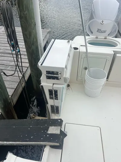 No Name Yacht Photos Pics 2015 Cobia 344 Center Console boat docked with fishing gear and equipment.