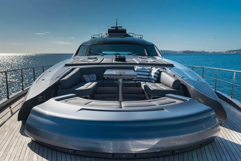 Aldebaran III Yacht Photos Pics Luxurious 2018 Pershing 108 yacht with elegant deck seating, cruising on a sunny ocean.