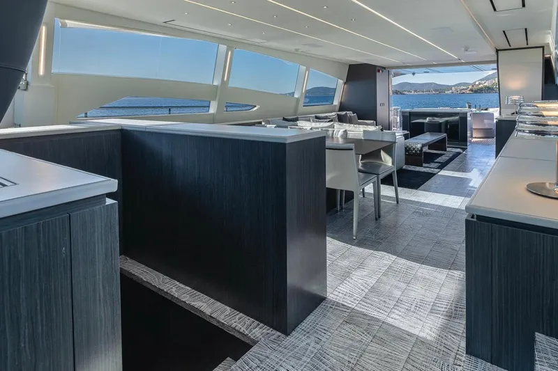 Aldebaran III Yacht Photos Pics Luxurious interior of 2018 Pershing 108 yacht with modern design and ocean view.