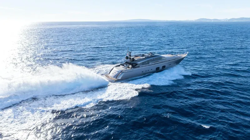 Aldebaran III Yacht Photos Pics Luxury Pershing 108 yacht cruising on open sea, 2018 model, creating waves.