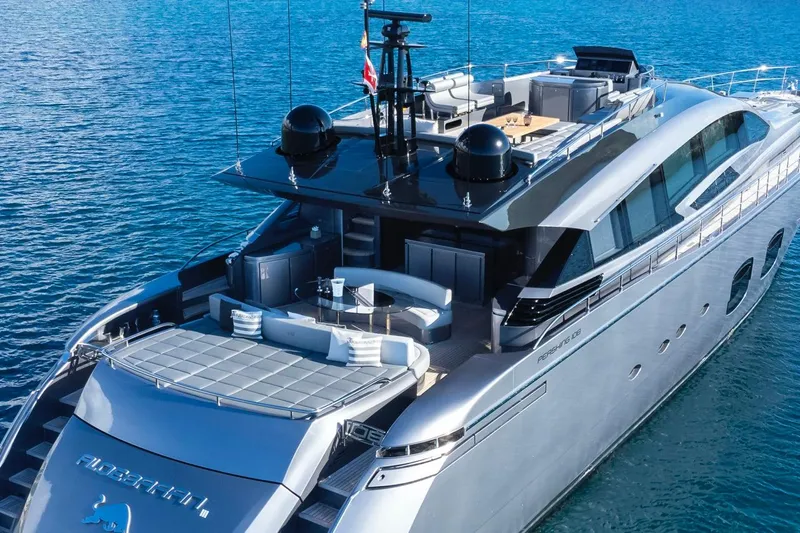 Aldebaran III Yacht Photos Pics Luxury 2018 Pershing 108 yacht on serene blue waters, showcasing sleek design and spacious deck.