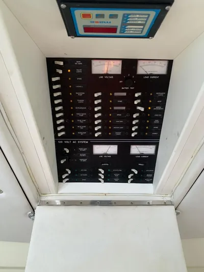 Legacy Yacht Photos Pics Electrical control panel on a 1973 Bertram 31 Flybridge Cruiser boat.